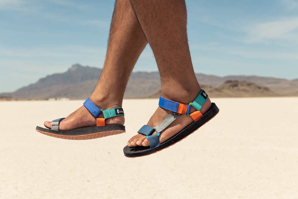 Outdoor-oriented footwear brand Teva and Cotopaxi collaborated on a sporty sandal and windbreaker with recycled and upcycled materials.