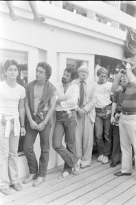 Day or night, casual clothes were always in order on Fire Island. But artist David Hockney stuck with the suit and tie for this event in the summer of 1976.