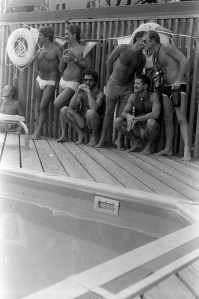 Weekenders liked to keep the dress code casual as proven by these bare-chested men at the pool.