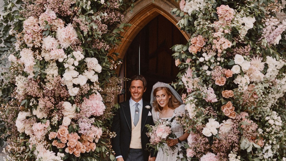 Princess Beatrice wedding. NEWS EDITORIAL USE ONLY. NO COMMERCIAL USE. NO MERCHANDISING, ADVERTISING, SOUVENIRS, MEMORABILIA or COLOURABLY SIMILAR. NOT FOR USE AFTER 18th January 2021 WITHOUT PRIOR PERMISSION FROM BUCKINGHAM PALACE. NO CROPPING. Copyright in the photograph is vested in Princess Beatrice and Edoardo Mapelli Mozzi and Benjamin Wheeler. Publications are asked to credit the photograph to Benjamin Wheeler. No charge should be made for the supply, release or publication of the photograph. The photograph must not be digitally enhanced, manipulated or modified in any manner or form and must include all of the individuals in the photograph when published. This official wedding photograph released by the Royal Communications of Princess Beatrice and Edoardo Mapelli Mozzi shows them leaving The Royal Chapel of All Saints at Royal Lodge, Windsor after their wedding. Issue date: Saturday July 18, 2020. See PA story ROYAL Beatrice. Photo credit should read: Benjamin Wheeler/PA Wire. URN:54642670 (Press Association via AP Images)