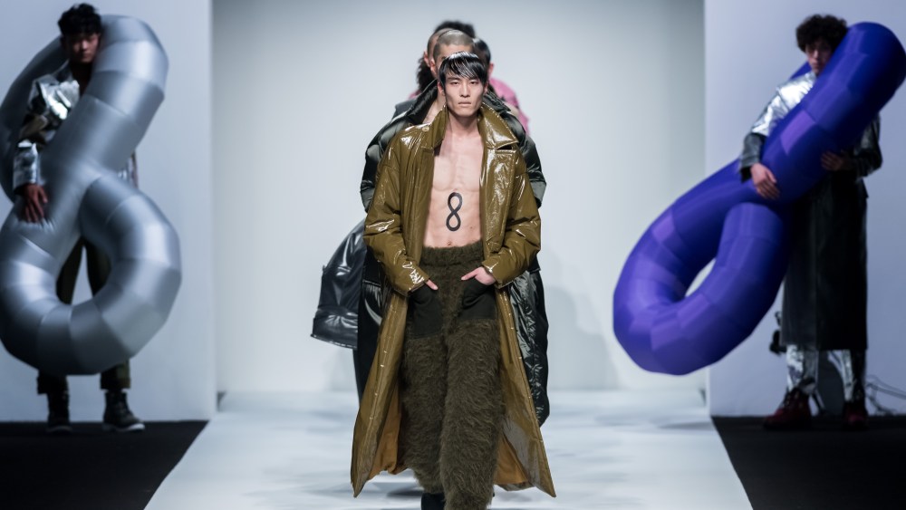 Models display new creations at the fashion show of Pronounce presented by GQ during the Shanghai Fashion Week.
