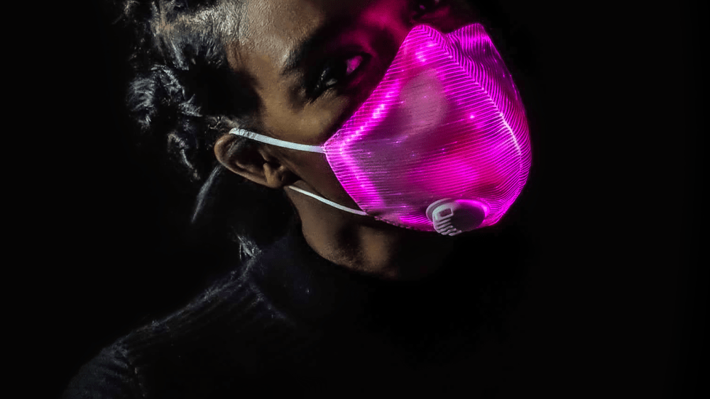 Asia Hall in a Neon Cowboys mask.