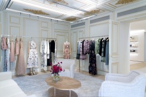 Eveningwear is showcased in a gilded salon.
