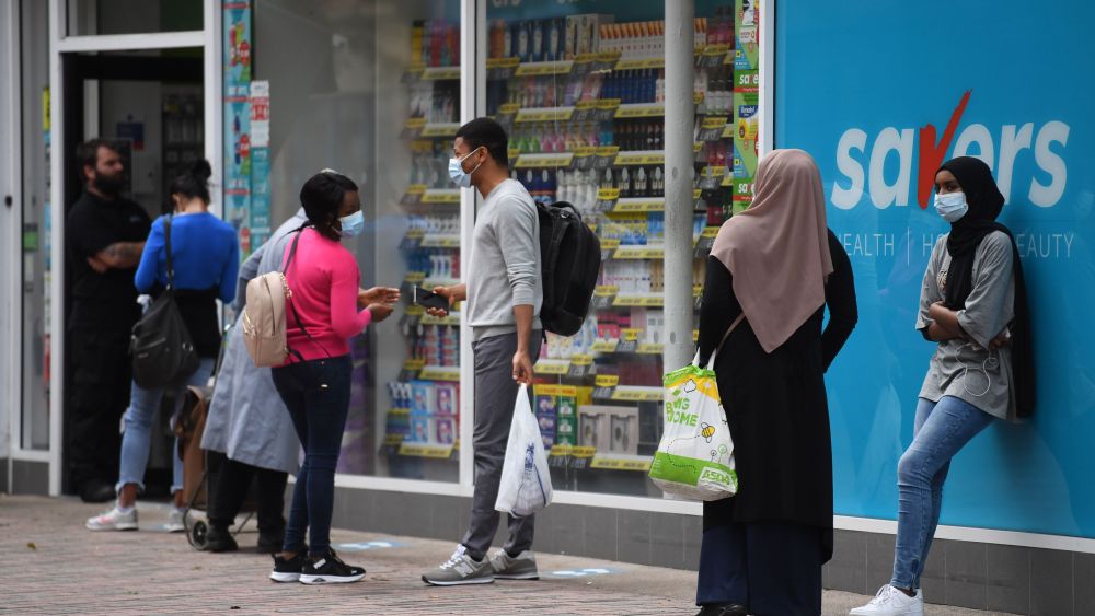 People wear face masks as they shop in Leicester city centre in Leicester, Britain, 30 June 2020.The City of Leicester is the first city in the UK to have to go into local lockdown after 10 percent of all new recorded cases in the UK in the past week were in the city. All non-essential shops in the city will close from 30 June and schools will close to most pupils from 02 July on. Pubs, restaurants, places of worship and other businesses will now remain closed for longer and not re-open on 04 July like the rest of the country.Coronavirus in Britain, Leicester, United Kingdom - 30 Jun 2020