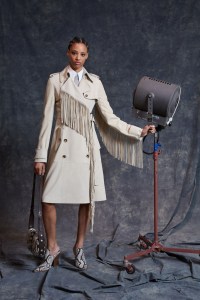 Michael Kors mused on the allure of fringe: ÒRight now, anything that gives you joy and feels fun.ÉYou want to put something on that lifts your spirits.Ó He used fringe to snazz up a practical coat for fall 2020.