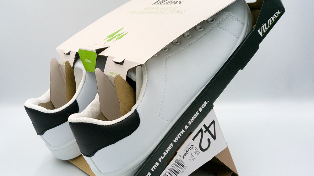 The Viupax shoebox is designed occupy less volume compared to a traditional shoebox, enabling more shoes to be loaded into shipping container packing. Here, the box is converted to a display stand.