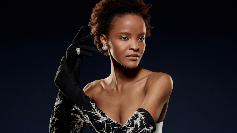 Van Cleef & Arpels' diamond earrings with Chanel elbow-length gloves adorned with Swarovski crystal, from the "Jewelry as Fashion as Jewelry" catalogue.