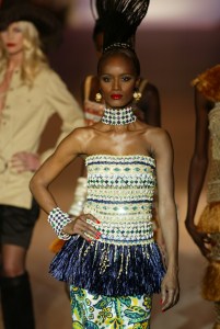 A model poses on the runway in an iconic look from  Yves Saint Laurent's 1967 "African" collection.