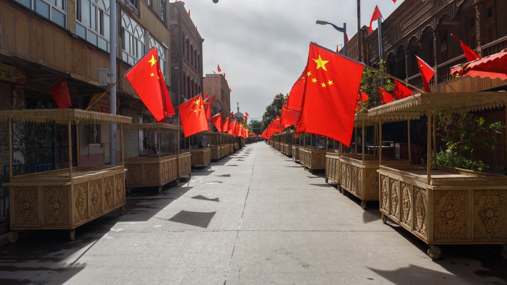street in xinjiang chinese flags