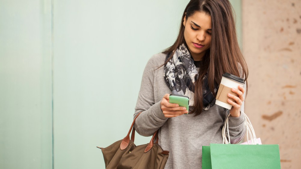 latinx hispanic woman shopping cell phone
