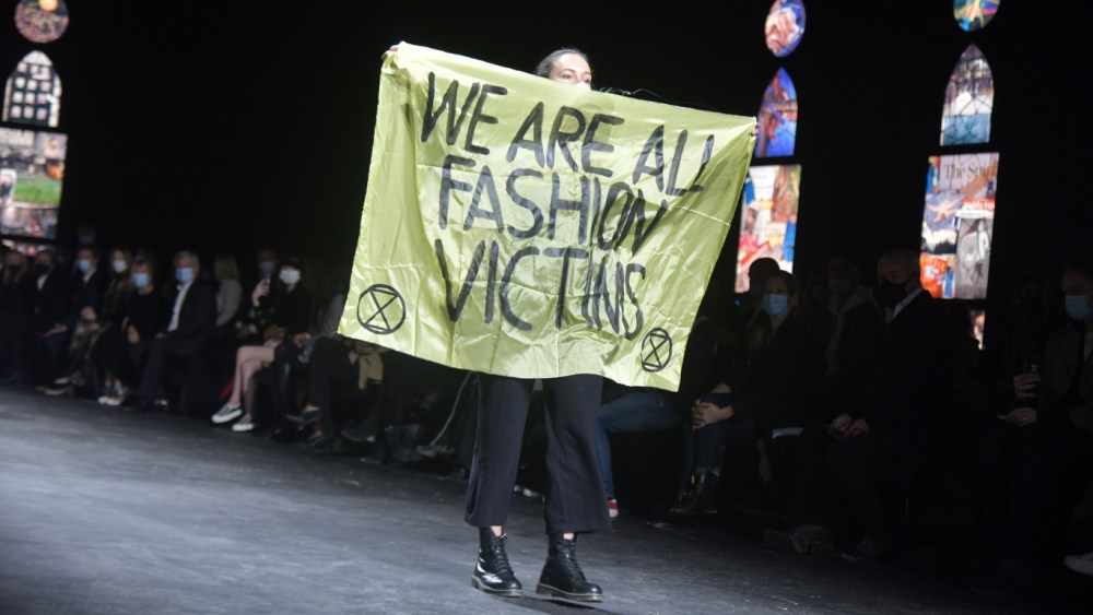 dior show extinction rebellion protest