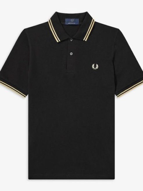 U.K. apparel brand Fred Perry denied association with U.S. hate group the Proud Boys after pulling sales of its polo shirt in 2019.
