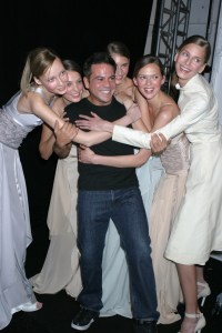 Narciso Rodriguez backstage with his models at the Fall 2004 Narciso Rodriguez show in New York.