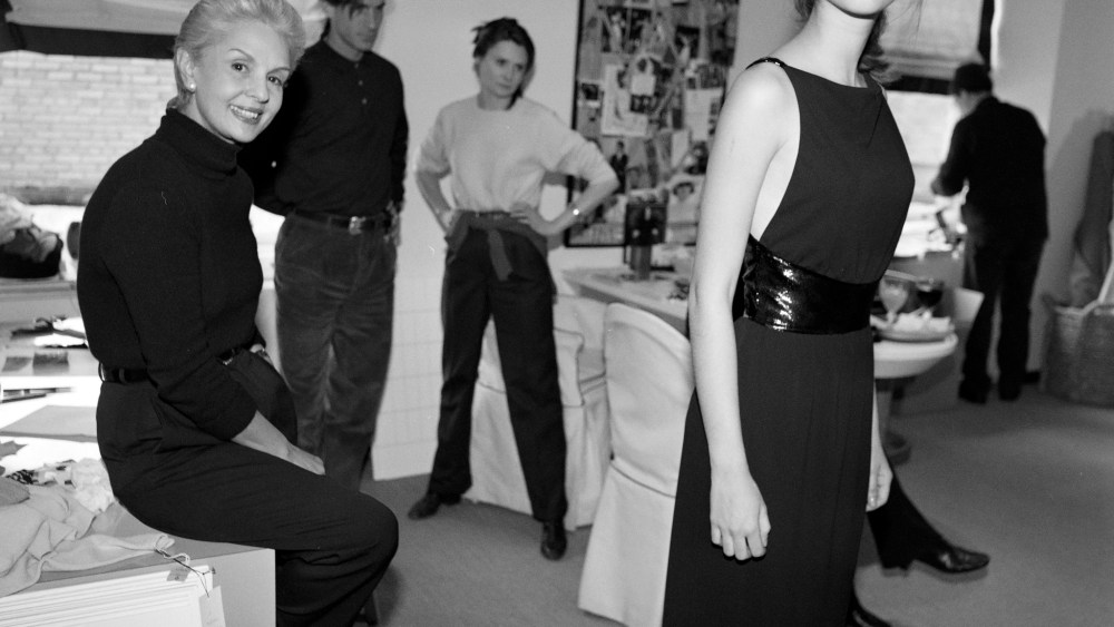 Designer Carolina Herrera and staff in fall fitting with model Gisele Bundchen.