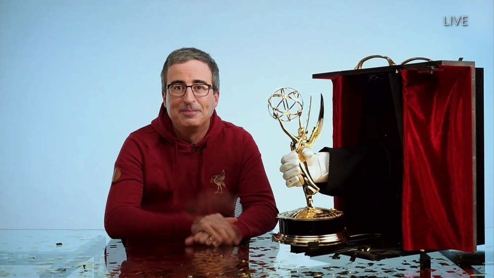 John Oliver from "Last Week Tonight with John Oliver" accepts the Emmy for Outstanding Variety Talk Series during the 72nd Emmy Awards telecast on Sunday, Sept. 20, 2020 at 8:00 PM EDT/5:00 PM PDT on ABC. (Invision for the Television Academy/AP)