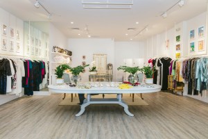 A large vintage table centers the Badgley Mischka store at the Royal  Poinciana Plaza in Palm Beach.