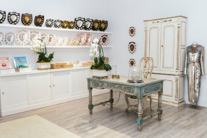 Vintage furniture came from the designers’ collection. The plaques at left are vintage equestrian prizes.