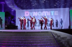 RM, V, Jimin, Jungkook, Jin, J-Hope, and Suga of BTS perform onstage.