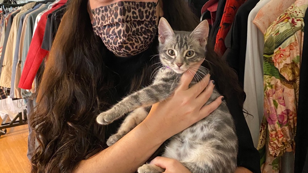 Vegan Fashion Showroom and Library founder Emmanuelle Rienda and her cat, Monkey.