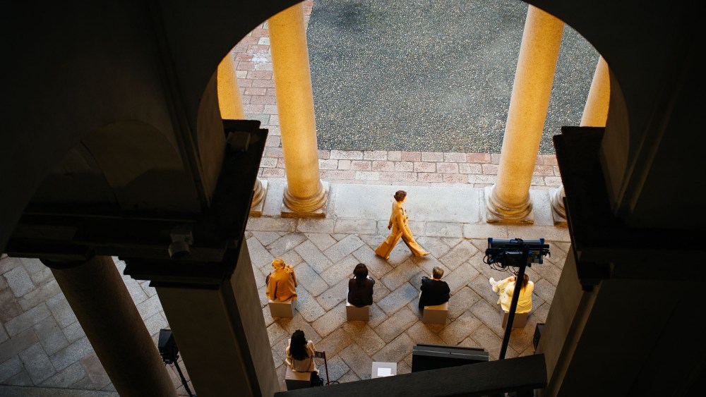 Milan brands did a great job keeping the general feeling of their shows 'normal'. This photo was taken at MaxMara. Spacing between the chairs is bigger, but apart from this, I think that nothing about this image tells the viewer that something is not right.