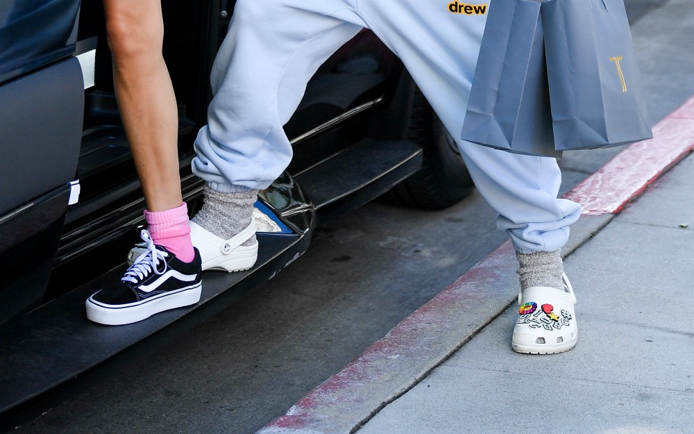 Justin Bieber, pictured with wife Hailey Baldwin, has been known to sport Crocs when out and about.