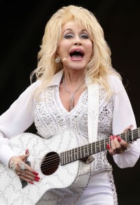Bedtime With Dolly. File photo dated 29/6/2014 of Dolly Parton who will perform weekly online bedtime readings for children, the country music star has announced. Issue date: Wednesday April 1, 2020. The singer, 74, said she wanted to "share some love" amid the coronavirus pandemic and unveiled a series called Bedtime With Dolly. See PA story SHOWBIZ Parton. Photo credit should read: Yui Mok/PA Wire URN:53263559 (Press Association via AP Images)