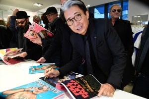 Kenzo Takada signs the 40th anniversary edition of Façade at Colette, 2017.