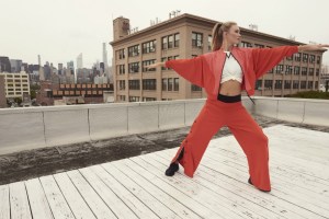 Co-created by Karlie Kloss, Adidas' new activewear collection includes a range of versatile activewear, from workout bras and tights to trend-inspired streetwear pieces.