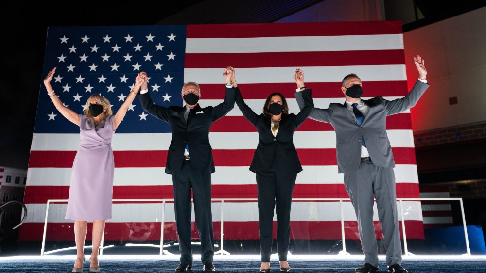 The president-elect and vice president-elect with their spouses, Jill Biden, far left, and Doug Emhoff, far right.