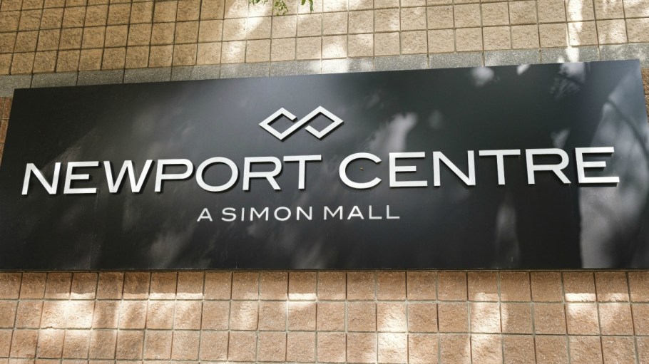 Simon Property Group and Taubman Centers will merge after all, after agreeing to a price reduction of $600,000 and valuing the deal at $3B.