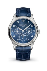 Patek Philippe's Ref. 5327G Ð MenÕs Perpetual Calendar in white gold with royal blue sunburst dial, applied Breguet numerals.Ê Ultra-thin mechanical self-winding movement. Day, date, month, leap year and 24-hour indication by hands.