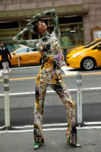 Rave Review’s top and pant made from spray-painted vintage cotton curtains over Shuting Qiu’s nylon and spandex bodysuit tights and shoes. Bea Bongiasca earrings.