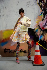 Kelsey Randall’s dress made from deadstock Sixties bedsheets under Matty Bovan’s cotton Liberty denim jacket with metal buttons and Carleen’s vest made from vintage quilts with Shuting Qiu’s tights and heels. Bea Bongiasca earrings; Gaviria necklace; Mounser necklace.