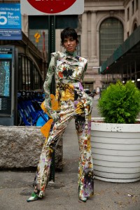 Rave ReviewÕs top and pant made from spray-painted vintage cotton curtains over Shuting QiuÕs nylon and spandex bodysuit tights and shoes. Bea Bongiasca earrings.