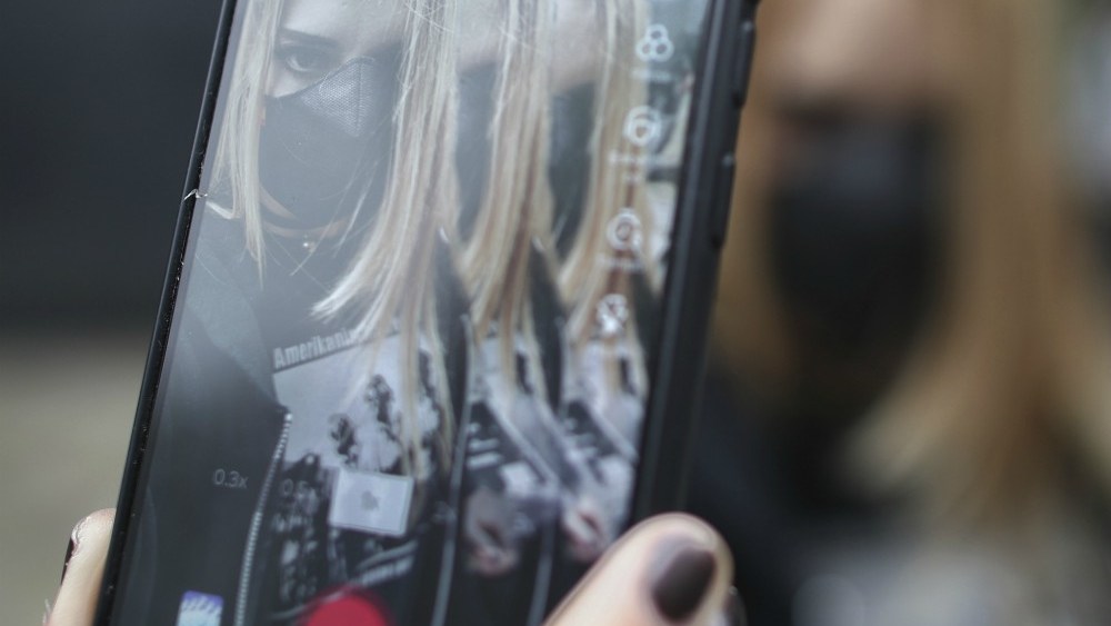 FILE - This Feb. 25, 2020, file photo, shows the icon for TikTok in New York. The popular video-sharing app TikTok, its future in limbo since President Donald Trump tried to shut it down earlier this fall, is asking a federal court to intervene. "With the November 12 CFIUS deadline imminent and without an extension in hand, we have no choice but to file a petition in court to defend our rights and those of our more than 1,500 employees in the US,” TikTok said in a written statement Tuesday, Nov. 11, 2020. (AP Photo/File)