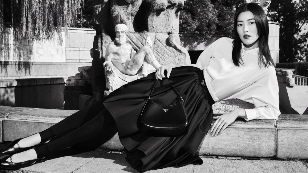 Liu Wen carrying a Prada Cleo bag.