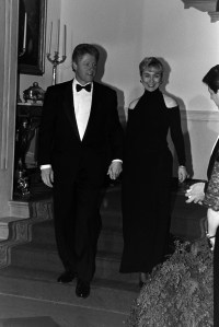 President Bill Clinton and First Lady Hilary Clinton arrive for the White House Governors Dinner in Washington, D.C. on January 31, 1993. Hilary Clinton wears a dress designed by Donna Karan.