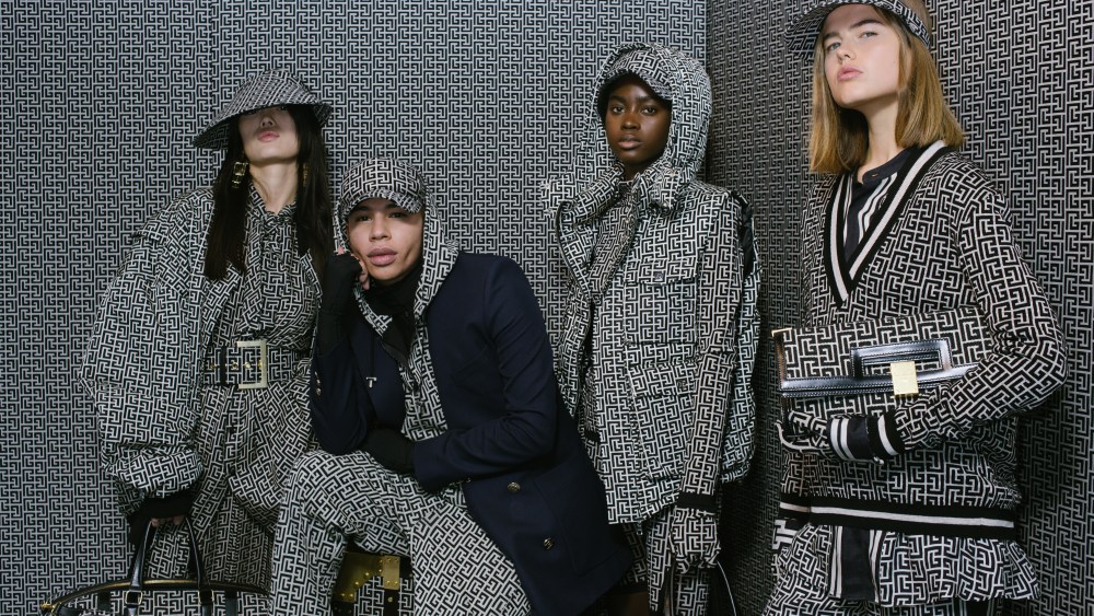 Olivier Rousteing shooting Balmain Pre-Fall 2021 collection in the windows of its Rue Saint-Honoré boutique.