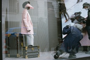 Olivier Rousteing shooting Balmain Pre-Fall 2021 collection in the windows of its Rue Saint-Honoré boutique.