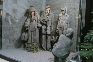 Olivier Rousteing shooting Balmain Pre-Fall 2021 collection in the windows of its Rue Saint-Honoré boutique.