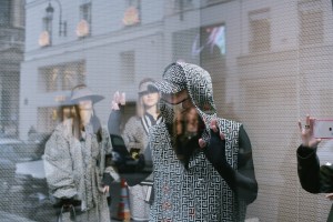 Olivier Rousteing shooting Balmain Pre-Fall 2021 collection in the windows of its Rue Saint-Honoré boutique.