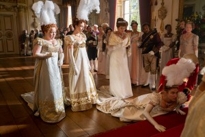 BRIDGERTON (L to R) NICOLA COUGHLAN as PENELOPE FEATHERINGTON, HARRIET CAINS as PHILLIPA FEATHERINGTON, BESSIE CARTER as PRUDENCE FEATHERINGTON and POLLY WALKER as PORTIA FEATHERINGTON in episode 101 of BRIDGERTON Cr. LIAM DANIEL/NETFLIX © 2020