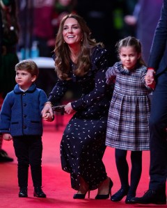 Royal visit to The Palladium. Prince Louis, the Duchess of Cambridge and Princess Charlotte attend a special pantomime performance at London's Palladium Theatre, hosted by The National Lottery, to thank key workers and their families for their efforts throughout the pandemic. Picture date: Friday December 11, 2020. See PA story ROYAL Cambridge. Photo credit should read: Aaron Chown/PA Wire URN:57055473 (Press Association via AP Images)
