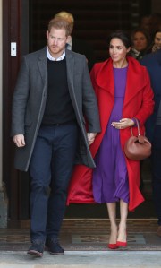 Royal visit to Birkenhead. The Duke and Duchess of Sussex depart Hamilton Square in Birkenhead, following a walkabout and a visit to a new sculpture marking the 100th anniversary of war poet Wilfred Owen's death. Picture date: Monday January 14, 2019. See PA story ROYAL Sussex. Photo credit should read: Danny Lawson/PA Wire URN:40617374 (Press Association via AP Images)