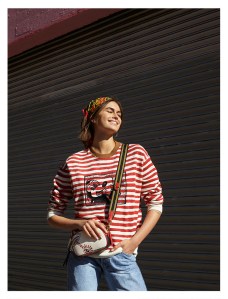Kaia Gerber in an image from the Coach Presents Disney Mickey Mouse x Keith Haring cookbook.