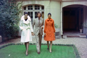 Designer Andre Oliver poses with a model in 1972 Pierre Cardin Couture