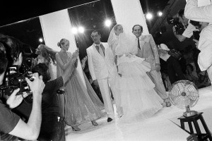 Designers Andre Oliver and Pierre Cardin with models on the runway at their Fall 1980 Couture show