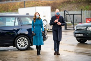 Duke and Duchess of Cambridge royal train tour. The Duke and Duchess of Cambridge during a visit to the Scottish Ambulance Service response centre in Newbridge, Edinburgh, on the second day of a three-day tour across the country. Picture date: Monday December 7, 2020. During the tour William and Kate will visit communities, outstanding individuals and key workers to thank them for their efforts during the coronavirus pandemic. See PA story ROYAL Train. Photo credit should read: Wattie Cheung/PA Wire URN:56988035 (Press Association via AP Images)