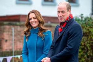 Duke and Duchess of Cambridge royal train tour. The Duke and Duchess of Cambridge meet staff and pupils during a visit to Holy Trinity Church of England First School in Berwick upon Tweed on the second day of a three-day tour across the country. Picture date: Monday December 7, 2020. During the tour William and Kate will visit communities, outstanding individuals and key workers to thank them for their efforts during the coronavirus pandemic. See PA story ROYAL Train. Photo credit should read: Andy Commins/Daily Mirror/PA Wire URN:56990458 (Press Association via AP Images)