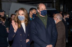 Britain's Prince William and Kate, Duchess of Cambridge visit Batley, England, Monday Dec. 7, 2020, on the second day of a three-day tour across the country. During the tour William and Kate will visit communities, outstanding individuals and key workers to thank them for their efforts during the coronavirus pandemic. (Arthur Edwards/Pool via AP)